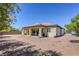 Expansive backyard featuring a covered patio and low-maintenance desert landscaping at 7286 Mount Kearsarge St, Las Vegas, NV 89131