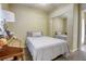 Bright bedroom with a mirrored closet door that creates a spacious atmosphere at 7286 Mount Kearsarge St, Las Vegas, NV 89131