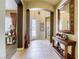 Inviting home entryway features tiled floors, elegant decor, and views into the living spaces at 7286 Mount Kearsarge St, Las Vegas, NV 89131