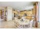 Well-lit kitchen with stainless steel appliances and a charming breakfast nook at 7286 Mount Kearsarge St, Las Vegas, NV 89131