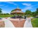 Inviting park gazebo with seating, perfect for outdoor gatherings and relaxation on a sunny day at 7286 Mount Kearsarge St, Las Vegas, NV 89131