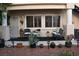 Ground level condo patio with seating and desert landscaping, plus easy access to the entrance at 7450 S Eastern Ave # 1012, Las Vegas, NV 89123