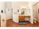 Bathroom featuring a wood vanity, tiled flooring and access to toilet and walk-in shower at 7540 Flowing Stream Dr, Las Vegas, NV 89131