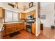 Functional kitchen offers stainless steel appliances, tiled backsplash, granite countertops, and ample cabinet space at 7540 Flowing Stream Dr, Las Vegas, NV 89131