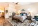 The spacious bedroom features a comfortable sitting area and ample natural light, creating a tranquil atmosphere at 7540 Flowing Stream Dr, Las Vegas, NV 89131