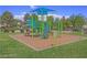 A vibrant playground features play structures and is the perfect place for children to have fun in the community at 7728 Whispering River St, Las Vegas, NV 89131