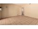 A bright living room with tile flooring provides a clean, modern look at 8041 Astrology Ct # 201, Las Vegas, NV 89128