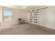 Bright bedroom with a large window and a barn door closet at 8061 Palace Estate Ave, Las Vegas, NV 89117