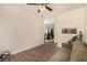 Comfortable bedroom featuring neutral walls and hardwood floors at 8061 Palace Estate Ave, Las Vegas, NV 89117