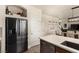 Modern kitchen with stainless steel appliances, shaker cabinets and ample storage space at 8061 Palace Estate Ave, Las Vegas, NV 89117