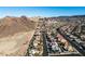 Aerial view of a desert community surrounded by mountains and offering beautiful scenery and a tranquil setting at 816 Sandsprings St, Henderson, NV 89011