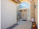 Charming front door with a large arched window above, providing ample natural light at 816 Sandsprings St, Henderson, NV 89011