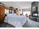 Comfortable bedroom boasts with fireplace, luxurious bed, and natural light streaming through windows at 816 Sandsprings St, Henderson, NV 89011