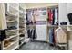 Well-organized walk-in closet with shelving, drawers, and hanging storage at 816 Sandsprings St, Henderson, NV 89011