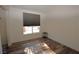 Well-lit room showcasing flooring and window with blinds at 851 Brahma Ln, Henderson, NV 89002