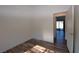 Bright bedroom with natural light and wood-style floors at 851 Brahma Ln, Henderson, NV 89002