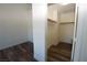 View of empty closet and bedroom with wood floors at 851 Brahma Ln, Henderson, NV 89002