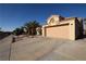Street view of a charming home featuring desert landscaping and a spacious two-car garage at 851 Brahma Ln, Henderson, NV 89002