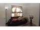 Cozy living room area with comfortable seating and a view from the window at 851 Brahma Ln, Henderson, NV 89002