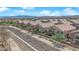 Aerial view of the community with desert landscaping and walking paths at 8658 Tom Noon Ave # 103, Las Vegas, NV 89178
