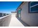 An upstairs balcony has views of the neighborhood and a sliding glass door at 9256 Alden Pointe Ct, Las Vegas, NV 89143