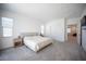 Large main bedroom with plush carpet, light neutral walls, and lots of natural light at 9256 Alden Pointe Ct, Las Vegas, NV 89143