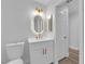 Modern bathroom featuring a new toilet, a vanity with white cabinets, and gold fixtures at 9412 Mount Cherie Ave # 102, Las Vegas, NV 89129