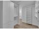 Walk-in closet with built-in shelving, plenty of storage space, and access to the bathroom at 9412 Mount Cherie Ave # 102, Las Vegas, NV 89129