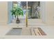 Close up of modern sink with a gold faucet and matching hardware at 9412 Mount Cherie Ave # 102, Las Vegas, NV 89129