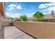 Outdoor patio with a view of mountains and neighborhood greenery at 9412 Mount Cherie Ave # 102, Las Vegas, NV 89129