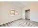 A cozy bedroom features a window, light-colored walls, and closet at 9712 Rocket Grove Ct, Las Vegas, NV 89178