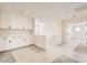 Bright bonus room with built-in cabinets and access to additional rooms at 9712 Rocket Grove Ct, Las Vegas, NV 89178