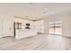 Modern, bright kitchen with white cabinets, stainless steel appliances, and a spacious center island at 9712 Rocket Grove Ct, Las Vegas, NV 89178