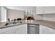 Bright kitchen with stainless steel appliances, light cabinets, and easy access to the living area at 9957 Fine Fern St, Las Vegas, NV 89183