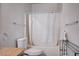 Bathroom featuring a shower with a white curtain, a toilet, and a light gray vanity with granite counters at 9975 Peace Way # 1024, Las Vegas, NV 89147