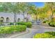 Beautifully landscaped common area with built-in barbecue grills and tables at 9975 Peace Way # 1024, Las Vegas, NV 89147