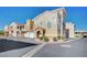 Charming townhouse with stucco exterior and well-maintained landscaping at 9975 Peace Way # 1024, Las Vegas, NV 89147