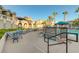 Inviting pool area with lounge chairs and lush landscaping at 9975 Peace Way # 1024, Las Vegas, NV 89147