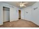 Charming bedroom with airplane themed wall decals and ceiling fan fixture at 1011 Pecos River Ave, Henderson, NV 89002