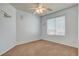 Bedroom with a themed decor, neutral carpet, and ample natural light at 1011 Pecos River Ave, Henderson, NV 89002