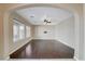 Open-concept living room with hardwood floors, a ceiling fan, and mount for your television at 1011 Pecos River Ave, Henderson, NV 89002