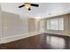 Bright living room boasting hardwood floors, ample natural light, and an open layout at 1011 Pecos River Ave, Henderson, NV 89002