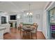 Charming dining area with a view, seamlessly connected to the living room and a private outdoor space at 10205 Camborne Ave # 104, Las Vegas, NV 89144