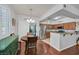 Charming breakfast nook adjacent to an open kitchen with stainless steel appliances and granite countertops at 10205 Camborne Ave # 104, Las Vegas, NV 89144