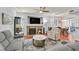 Cozy living room with a fireplace, plush seating, and stylish decor, creating a warm and inviting atmosphere at 10205 Camborne Ave # 104, Las Vegas, NV 89144