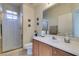 Well-maintained bathroom with glass-enclosed shower and spacious vanity at 10952 Porto Foxi St, Las Vegas, NV 89141