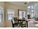 Open dining area with abundant natural light and views of the living room at 10952 Porto Foxi St, Las Vegas, NV 89141