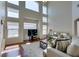 Bright and sunny living room with high ceilings and lots of natural light at 10952 Porto Foxi St, Las Vegas, NV 89141