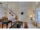Bright living room with wood floors and staircase to the second story at 10952 Porto Foxi St, Las Vegas, NV 89141