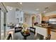 Open living room and kitchen area perfect for entertaining at 10952 Porto Foxi St, Las Vegas, NV 89141